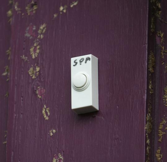 The doorbell at an alleged brothel near Providence’s Federal Hill is labeled “spa.’’
