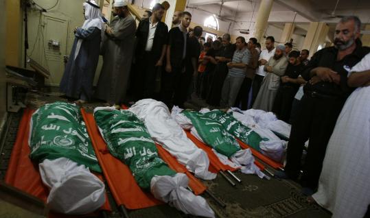 Up to 28 people died in a battle between Hamas security forces and militants from an Al Qaeda splinter group at a mosque in Rafah yesterday. Among the dead was the splinter group’s leader. Above, Palestinian mourners prayed over Hamas forces.