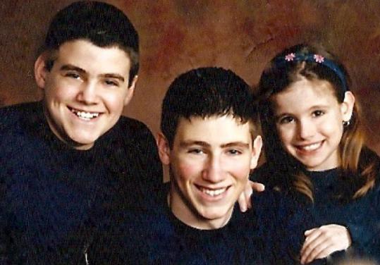 A family photograph of Dan, Mark, and Lisa Palermo.