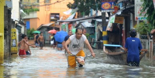 A squatter area on the outskirts of Manila was flooded yesterday after Typhoon Parma pummeled the Philippines.