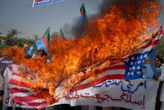 Protesters in Pakistan rallied against the United States yesterday as leaders in Parliament discussed a new US aid package that one official called crucial in the fight against terrorists.