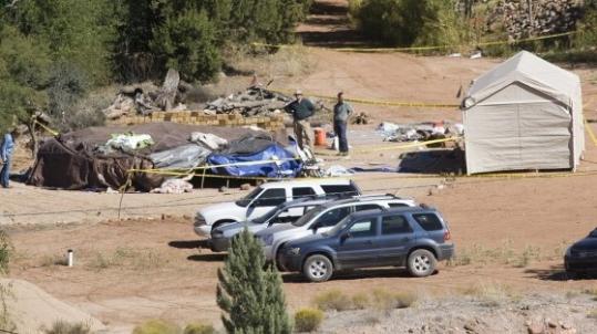 Investigators looked over a sweat lodge at a 'Spiritual Warrior' retreat in Sedona, Ariz., conducted by self-help expert and author James Arthur Ray.