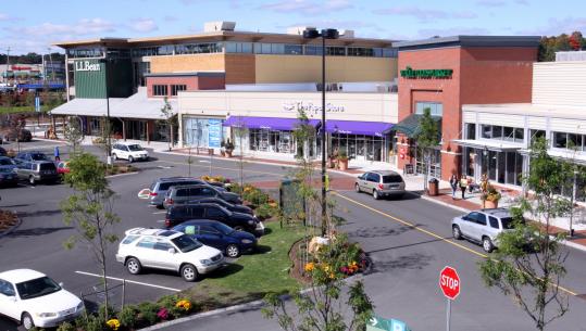 Succeeding a generation of windowless, totally enclosed malls, Legacy Place in Dedham encourages open-air window shopping.