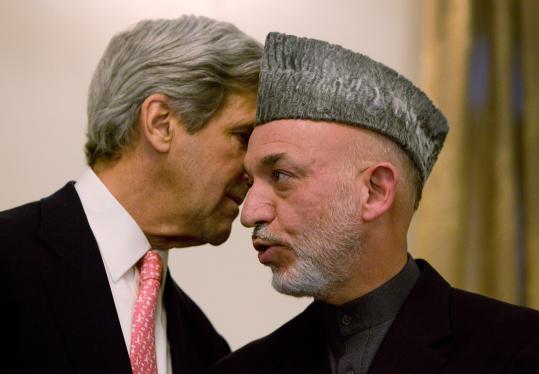 Senator John F. Kerry and Afghan President Hamid Karzai spent five days in talks before reaching the runoff decision.