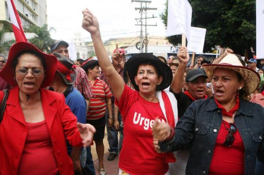 Supporters of ousted President Manuel Zelaya shouted slogans against coup leader Roberto Micheletti in Tegucigalpa yesterday.