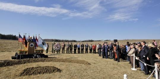 Interior Secretary Ken Salazar spoke to those in attendance before the ceremony in Shanksville, Pa., yesterday. The government hopes to have the first phase of the memorial completed by Sept. 11, 2011.