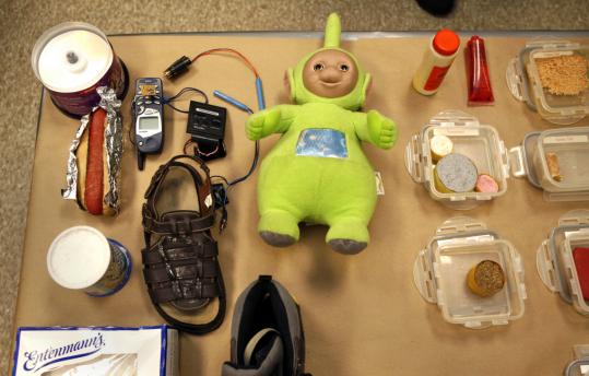 Scientists at the Transportation Security Laboratory pack harmless-looking explosives into a shoe, a Teletubbies doll, and other objects. Then, they figure out ways to keep them off of planes.