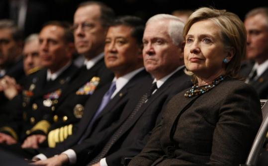 Secretary of State Hillary Rodham Clinton and Defense Secretary Robert Gates listened to the president’s new plan.