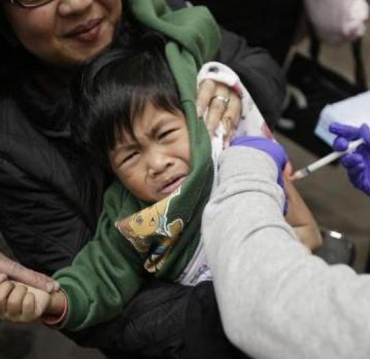 A 3-year-old got an H1N1 shot in San Francisco. Children under 4 are most susceptible.