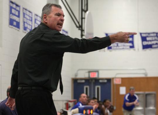 Coach Don Byron of Oliver Ames called to one of his players in a game Tuesday at Southeastern Regional Vocational Tech.