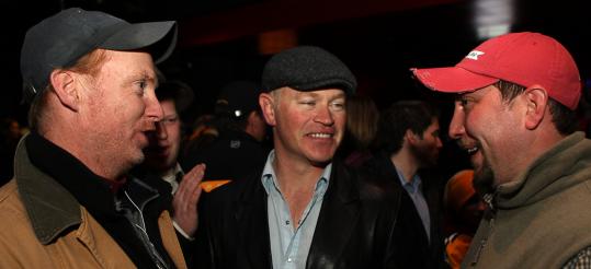 Actor Neal McDonough (center), who played in the Legends Classic at Fenway, with Mark Weller (left) and John McLaughlin at the postgame party.
