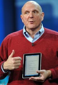 Microsoft chief Steve Ballmer displayed a tablet-style computer yesterday that will be available later this year.