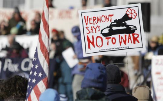An antiwar protester held a sign during a rally at the State House in Montpelier in February 2006.