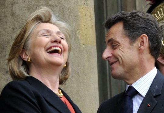 Secretary of State Hillary Rodham Clinton with France’s President Nicolas Sarkozy in Paris yesterday. Clinton praised US-European security cooperation at France’s Ecole Militaire.