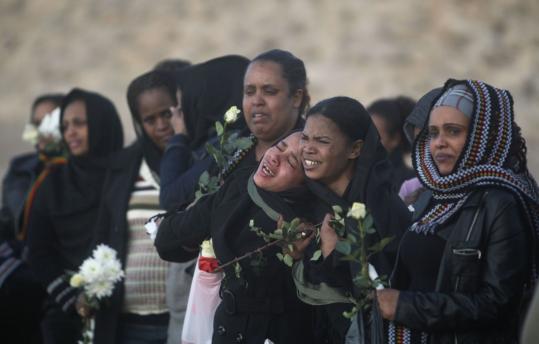 CRASH VICTIMS MOURNED - Relatives of passengers of Ethiopian Airlines flight ET409, which crashed into the Mediterranean on Jan. 25, killing all 90 aboard, grieved yesterday at the site of the accident south of Beirut.