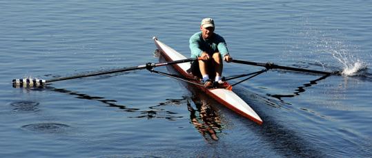 Leo Rosette, shown training on the Charles River, is aiming to become the oldest American to row across an ocean alone.