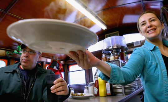 At the Boulevard Diner in Worcester, a National Historic Landmark that was built in 1936 and has been family-run since the 1960s, Emily Palmas serves a plate of eggs . . . over easy.