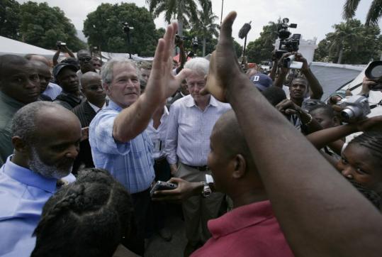 Former  presidents George W. Bush and Bill Clinton toured Port-au-Prince  yesterday with Haiti’s leader, RenÃ© PrÃ©val. The Clinton Bush Haiti  Fund has raised $37 million for quake relief.