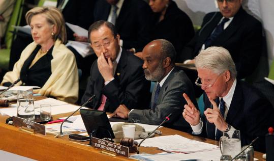 Secretary  of State Hillary Rodham Clinton, UN Secretary General Ban Ki-moon,  President RenÃ© PrÃ©val of Haiti, and Bill Clinton, UN special envoy to  Haiti, at the UN conference yesterday.