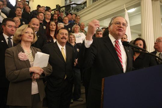 House Speaker Robert A. DeLeo unveiled the bill to license two resort casinos in Massachusetts and slot machines at the state’s four racetracks yesterday.
