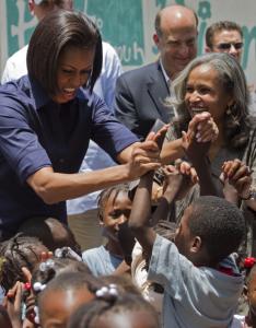 Michelle Obama and Elisabeth Debrosse PrÃ©val, wife of Haiti’s  president, visited a Port-au-Prince center for displaced youth.