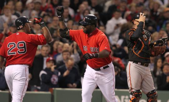 David Ortiz crosses the plate after his solo shot off Jeremy Guthrie in the second.