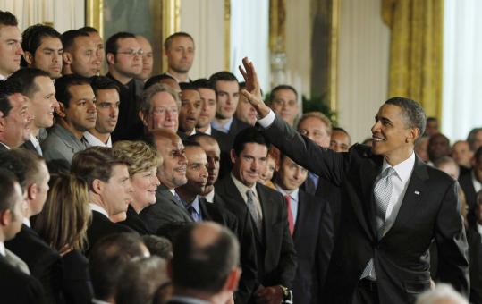 President  Obama hosted the New York Yankees yesterday. He congratulated the team  on its World Series win, saying, 'It's been nine years since your last  title, which must have felt like an eternity for Yankees fans. That  attitude, that success, has always made the Yankees easy to love and,  let's face it, easy to hate as well.'