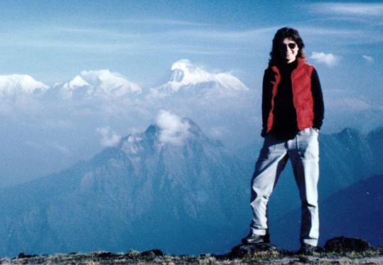 Ms. Jenkins, pictured hiking in the Himalayas, saw “all sides of issues,’’ a former colleague said.