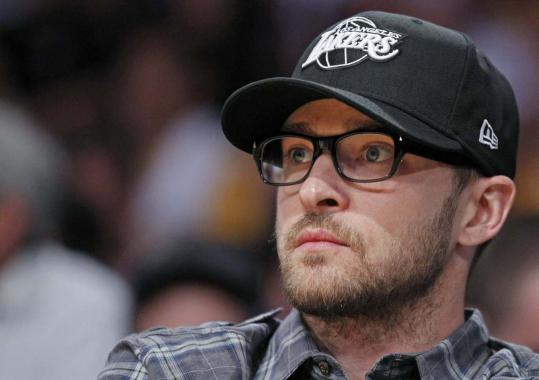 Justin Timberlake keeps an eye on the action.