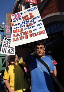 Demonstrators opposing Arizona’s immigration law marched at Fenway Park.