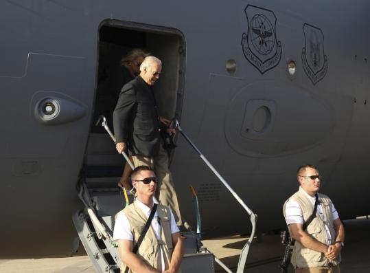 Vice President Joe Biden stepped off a military aircraft upon arrival in Baghdad for a Fourth of July holiday weekend visit. It was his fourth trip to Iraq as vice president.