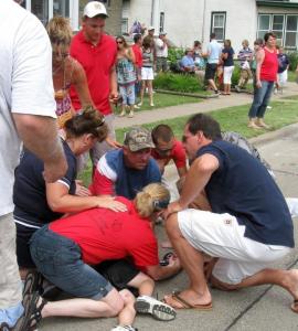Paradegoers helped a child, one of 24 people hurt by a pair of runaway horses at Fourth of July festivities in Bellevue, Iowa.