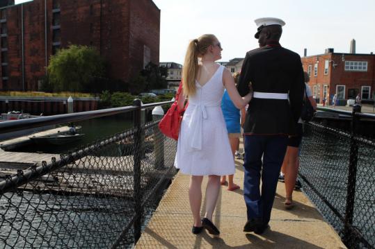 Lianne Smith and Luke Wanami, who just became a US citizen, left the USS Constitution after the ceremony yesterday.