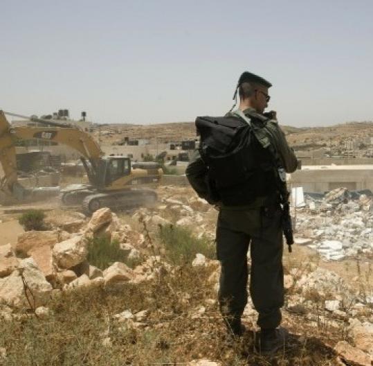 An Israeli bulldozer destroyed a Palestinian structure  in East Jerusalem.