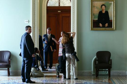 Senator Scott Brown spoke to reporters after he helped pass the Wall Street overhaul bill Thursday. The Democrats  unemployment bill is expected to pass next week without him.