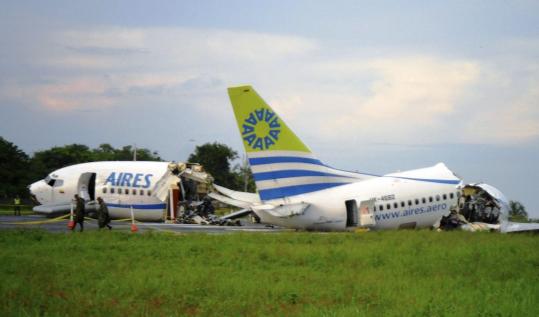 Aires Flight 8520 split apart after crashing in a thunderstorm yesterday on San Andres Island, a Colombian resort area.