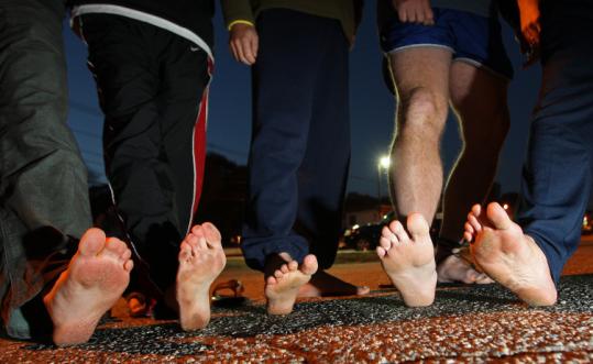 Members of a barefoot running club in Woburn toed the line when they took a jaunt around the neighborhood last October.