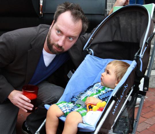 Comedian Tom Green met 8 1/2-month-old Nate James of Cambridge while visiting the Lampoon Castle yesterday.