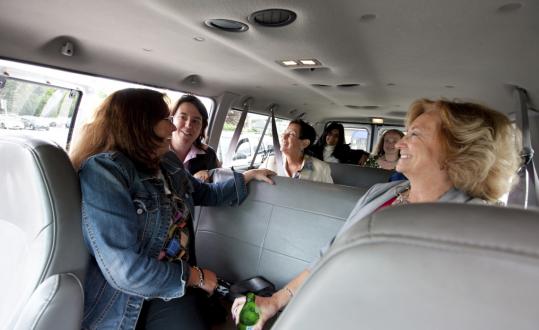 From left, state Representatives Kathi-Ann Reinstein, Ann-Margaret Ferrante, Alice Wolf, and Pat Haddad traveled by van yesterday to campaign for freshman female representatives.
