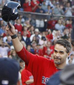 After leaving Game 1 in the fifth inning — following his second hit — Mike Lowell waved goodbye.