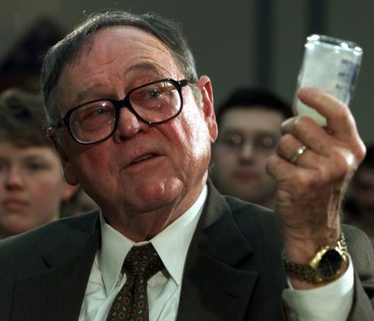 Dr. William C. Patrick III held a bottle showing what the chemical anthrax may look like in Washington in 1999.