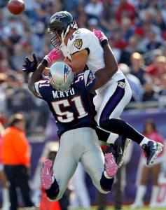 Jerod Mayo closes on Todd Heap but makes a play on the ball; the helmet-to-helmet hit on a defenseless Heap soon after by Brandon Meriweather has caused concern.