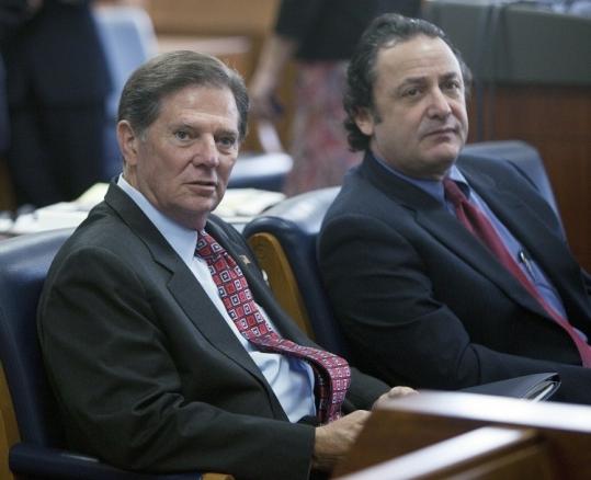 Former House leader Tom DeLay (left), in court yesterday, is accused of funneling corporate funds to GOP races.