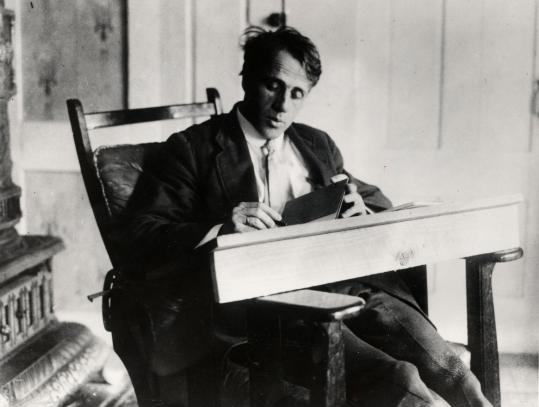Poet Robert Frost (shown here circa 1915) made his first foray into teaching at Methuen’s Second Grammar School. The 1893 attendance register at right was handwritten and signed by Frost. Restoration work on the document (below) is nearly complete.