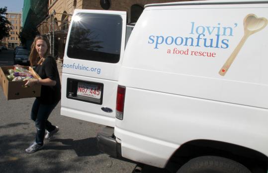Ashley Stanley unloads food at Pine Street Inn. She started Lovin’ Spoonfuls in January to collect and deliver mostly perishable foods to organizations that feed the hungry around Boston. Stanley hopes to add another truck soon.