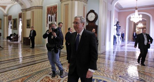 Senate Minority Leader Mitch McConnell of Kentucky said in a speech yesterday that the tax compromise was an essential first step toward addressing the nation’s deficit, by “cutting off the spigot” of tax income to the federal government to force Congress to make spending cuts.
