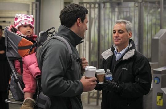 Rahm Emanuel campaigned yesterday in Chicago, where a panel found he met residency requirements to run for mayor.