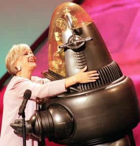 Anne Francis with Robby the Robot in 1998. The two starred in the science fiction thriller “Forbidden Planet’’ (1956).