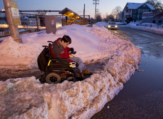 Christopher Hart of Hyde Park found his way blocked by a wall of snow Thursday.