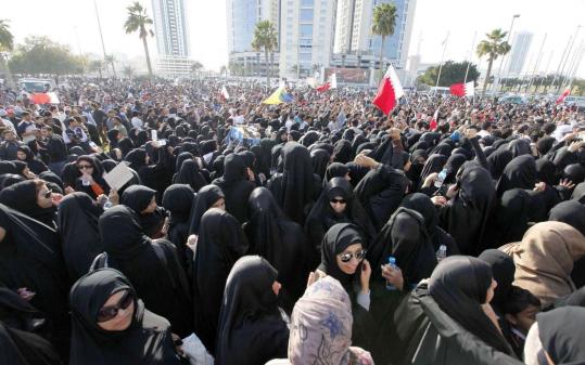 Thousands of protesters gathered at Pearl Roundabout in Manama, Bahrain. A man was killed in clashes at a rally earlier.